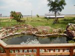 Dirt moved in for sitting area and flower beds.JPG