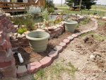 Flower beds filled with dirt.JPG