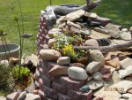 Flower and vine planter on waterfall edge.JPG