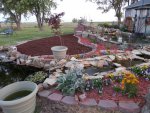 New brown mulch in new sitting area.JPG