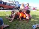 Neighborhood kid pile-up on Eric.JPG