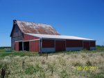 Big barn south and east sides before.JPG